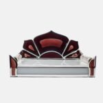 Modern glass devpaat featuring a deep maroon lotus-shaped backrest with silver mirror borders and a frosted glass base, handcrafted by Creata Poojaghar.