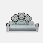 Modern glass devpaat with a stylized lotus petal backrest and reflective mirror borders on a frosted glass base, handcrafted by Creata Poojaghar.